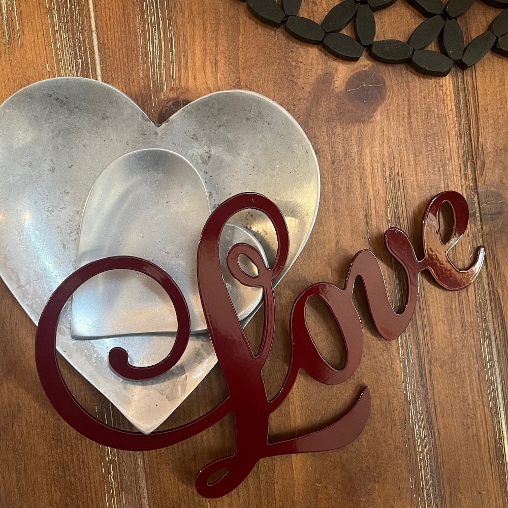 Red metal Love sign
